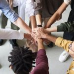 Team Diversity - Photo Of People Holding Each Other's Hands