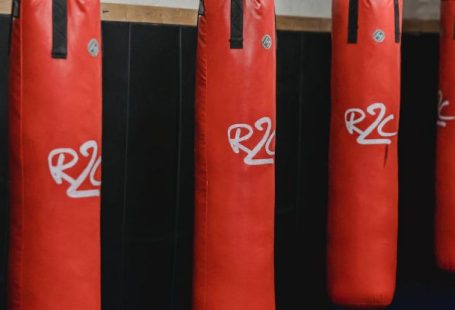 Supply Chain Risk - Interior of boxing gym with heavy punching bags hanging on chains for workout