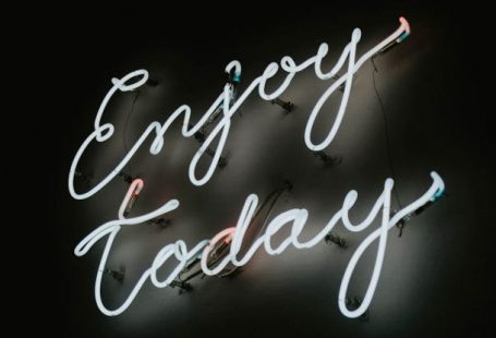 Staying Motivated - Neon Sign in a Black Background